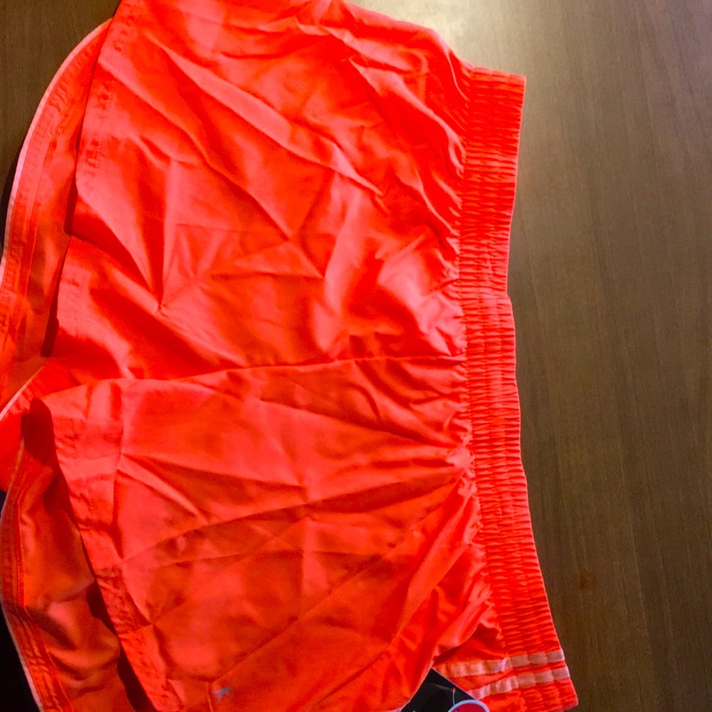 Danskin Now Women’s shorts. Neon orange XL16-18